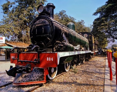 Historic locomotive at the bridge on the River Kwai