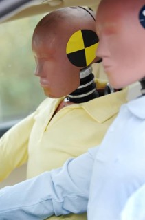 Crash test dummies in a car