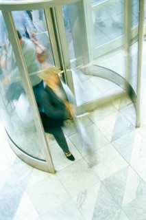Revolving door with people