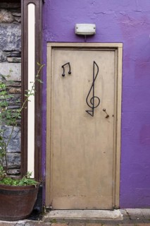Front door with a clef
