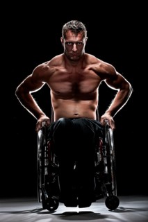 Muscular wheelchair user with a bare chest