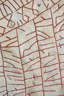 Historic Nordic runes engraved in stone