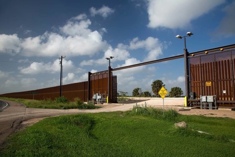 A nearly-completed section of the border fence that separates the United States from Mexico
