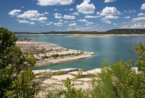 An extreme drought has lowered the water level in Lake Travis by nearly 60 feet