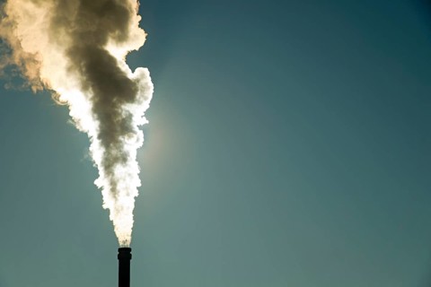 Smoking chimney of a modern biomass-fired power station