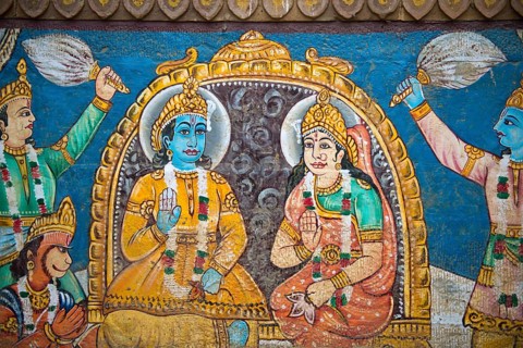 The god Shiva and the Mother Goddess Ganga painted on the wall of a house on the banks of the Ganges River