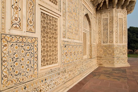 Façade with intricate marble inlays of an Islamic mausoleum