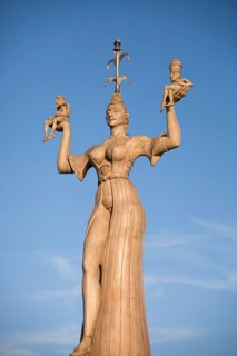 Imperia statue by sculptor Peter Lenk at the port entrance
