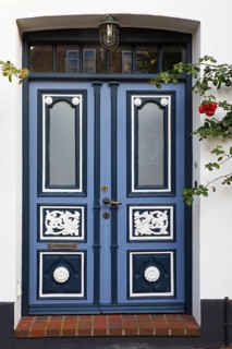Historical house with decorative wooden door