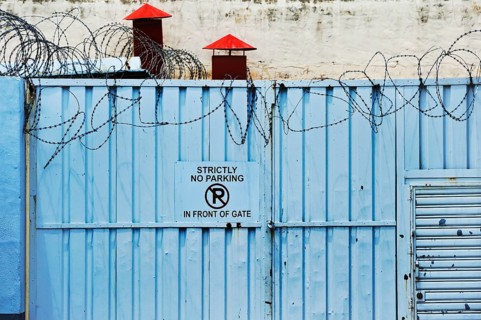 Iron gate with barbed wire