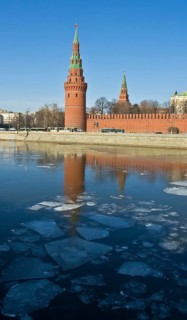 Vodovzvodnaya or Sviblova Tower of Moscow Kremlin and Moskva River with ice floes