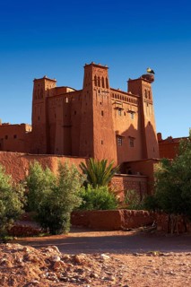 Mud buildings of the fortified Berber Ksar of Ait Benhaddou with a stork's nest