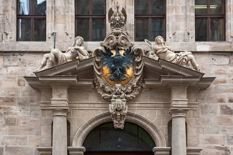 Portal of the west facade with imperial eagle and goddesses