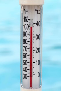Pool thermometer showing 100 degrees Fahrenheit