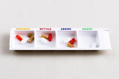 Tablet dispenser filled with pills for the whole day