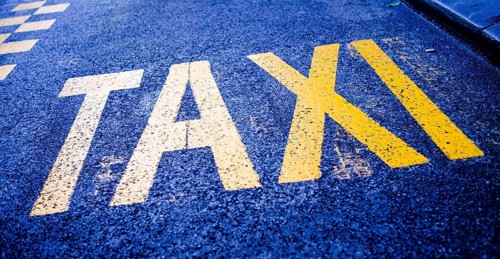 Taxi marking on a traffic lane.