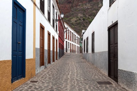 Street with typical houses in the old district of Las Casas