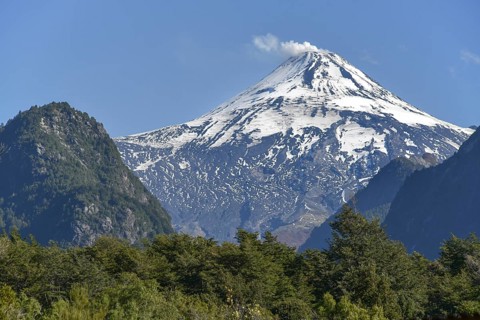Smoking and snow-covered volcano Villarrica