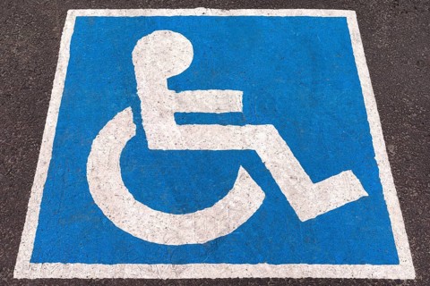 Blue marked parking place for disabled people