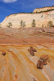 Plateau of colourful sandstone at the foot of Checkerboard Mesa