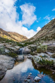 Golo River flows through barren rocky landscape