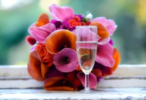 Bridal bouquet and champagne glass