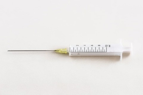 A syringe with a hypodermic needle