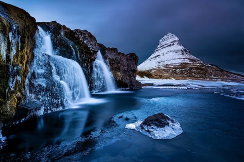 Peak of Kirkjufell with waterfall