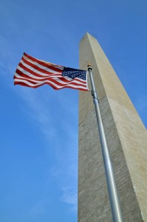 Washington Monument and flag of the United States