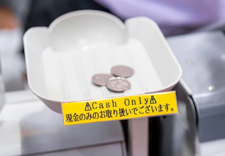 Money on cash register