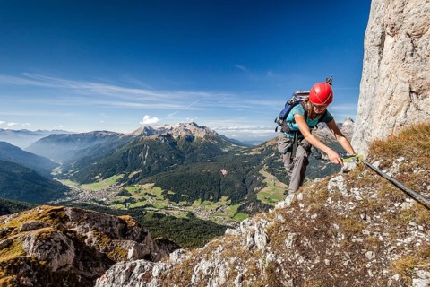 Mountaineer during the ascent to Cima Valacia on the Via Ferrata F. Gadotti in the Val San Nicolo di Fassa