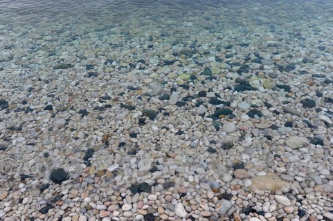 Pebbles on the beach of La Olla in Altea