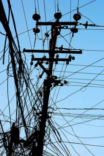Tangled power cables on a power pole