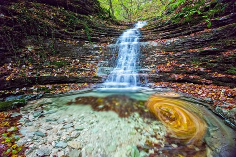 Waterfall in the forest in autumn