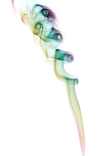 Colourful smoke from an incense stick or joss stick