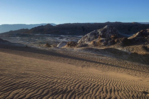 Sand dune in the Valle de la Luna or Valley of the Moon in the evening light