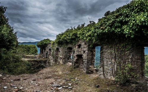 Ruins of the church of Santa Maria di Riscamone against dramatic sky