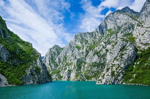 Sheer cliffs in the Koman water reservoir
