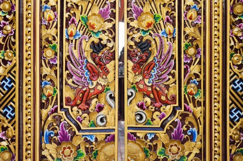 Entrance gate decorated with wood carving