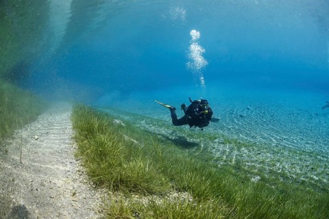 Diver next to the flooded trail