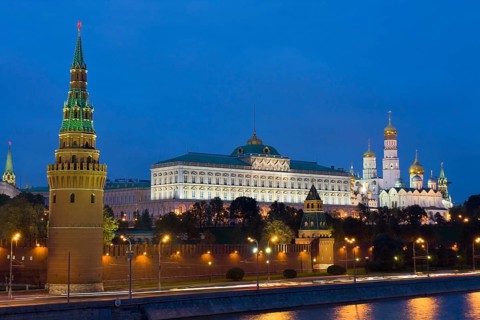 Moscow Kremlin with palace and cathedrals on Moskva River at night