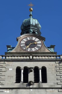 Clock tower of the Basilica of St. Emmeram against blue sky