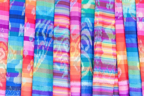 Colourful textiles on display for sale