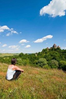 Woman looking at the fortified Saxonian church