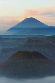 Sunrise over the smoking Gunung Bromo volcano