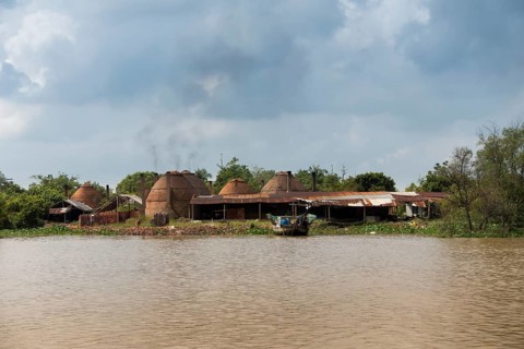 Charcoal burning in the Mekong Delta