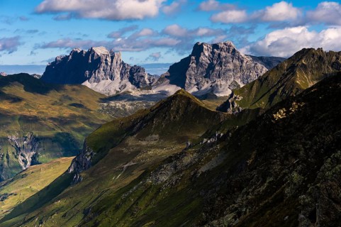 Mountain top with cloudy sky