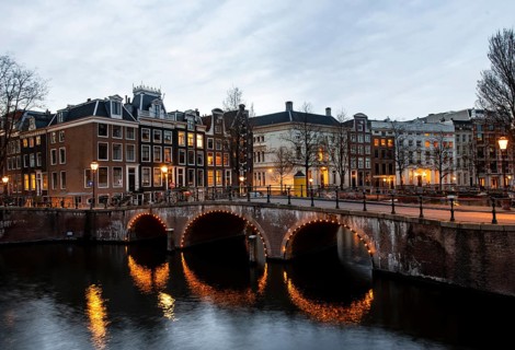 Canal with bridge at dusk