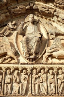 Gothic sculptures of Christ Pantocrator surrounded by the four Evangelist symbols