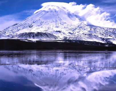 Parinacota volcano with reflections in the lake Lago Chungara